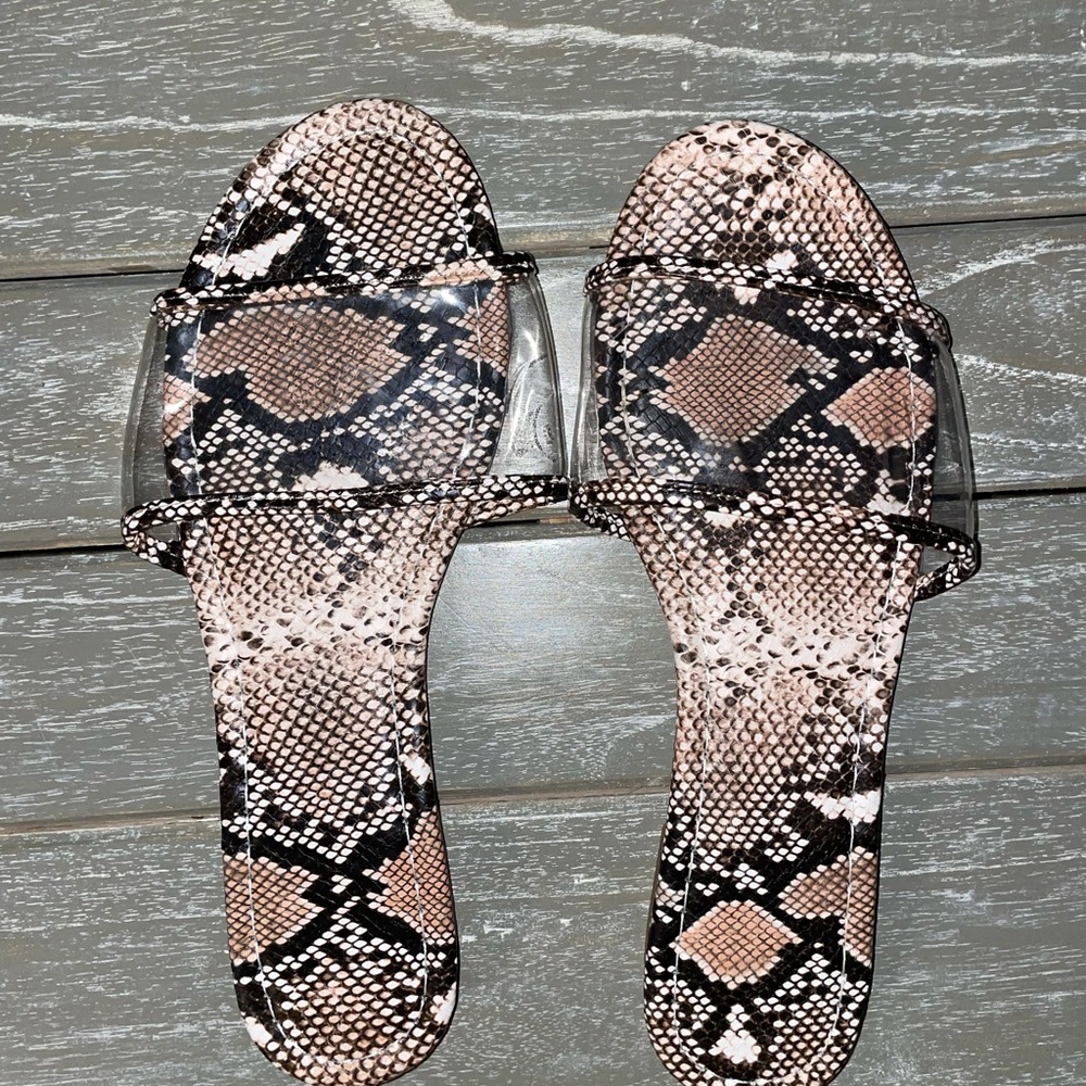 Never worn, size 9 snakeskin slides